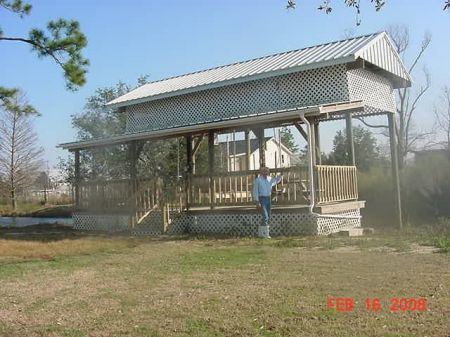 Boathouse updated with new railing.