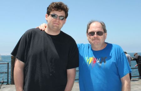 Father and Son enjoyinjg the fresh sea air.