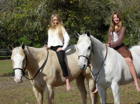 My girls and their horses.