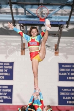 Alexis in a cheerleading stunt at competition !!