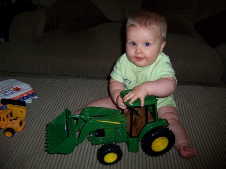 Sam (seven months old) playing with tractors