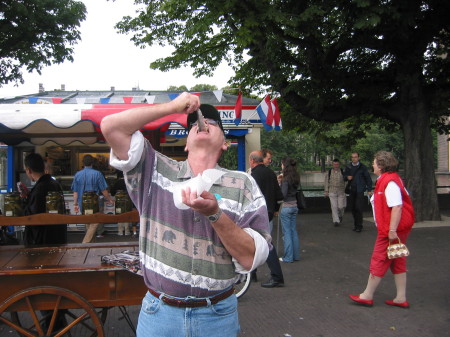 Neil eating pickled herring from a roadside stand in the Netherlands