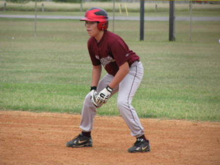 Alex playing baseball