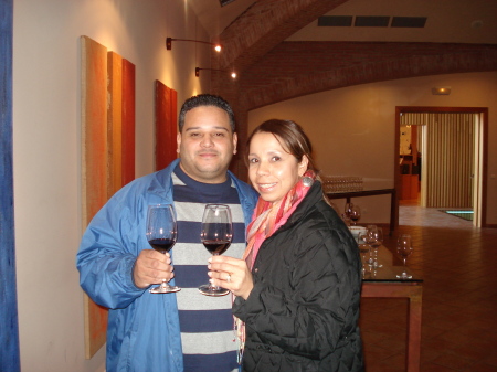 Daisy and Victor having wine at the vineyard!