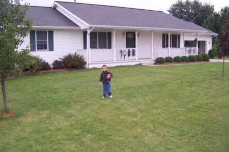 5 year old Tyler and our house in the suburbs