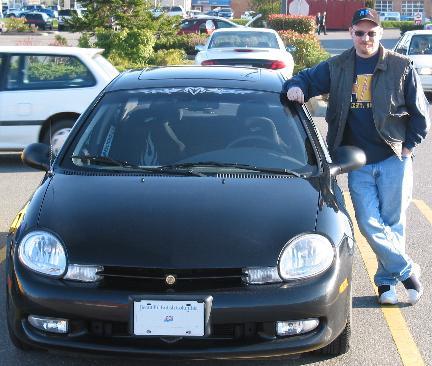 Me and my former vehicle, now sold.