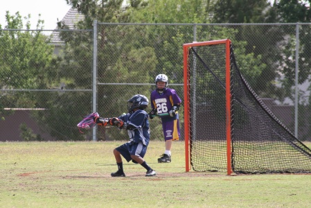 Deven playing Lacrosse goalie