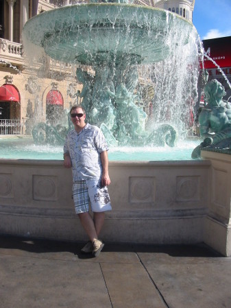 Roger by fountain at Paris