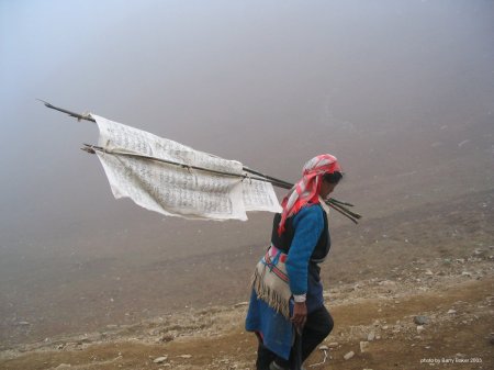 Tibetan woman with prayer flag