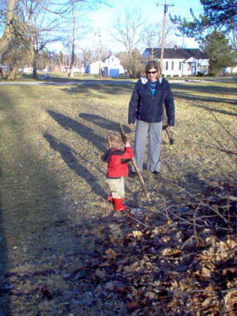 Luke and I gathering sticks in the yard in March 2007