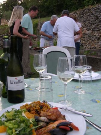 Albert cooks paella