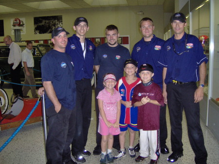 the kids w/Jimmy Johnson's pit crew(Nascar driver 48 and '06 Nextel Cup Champion)