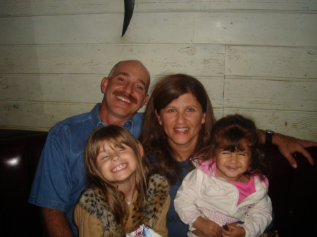 Me, Mark and our Grandgirls, MacKenzie and Madison