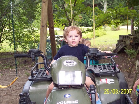 Come on Dad...Get on,  I'm driving!!