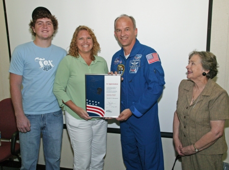 Me receiving a Silver Snoopy award