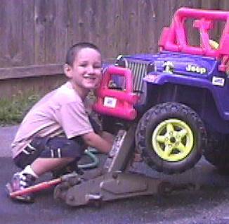 Josiah Fixing the Car