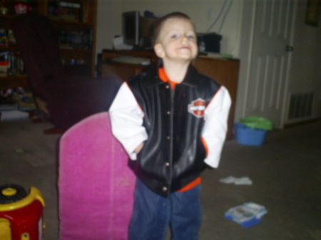 My baby son showing off his new birthday clothes...2006