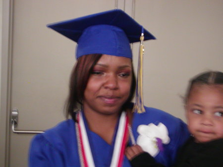 My daughter on her graduation with son