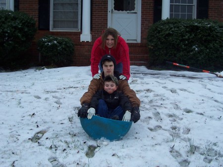Marlayna, Phil and  Caleb playing in the snow