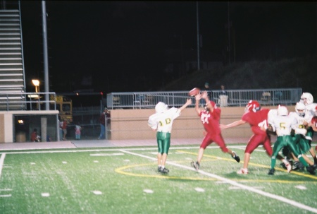 Tyler throwing a touchdown pass against Dodge City