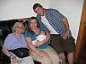 My Mom, my son Ian, and me holding my grandchild!