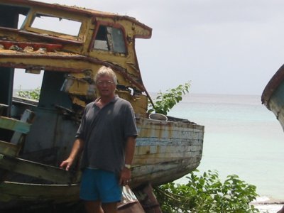 Checking out an old wooden boat in Barbados