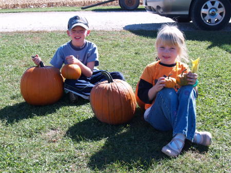 Cody & Charlotte picking pumpkins