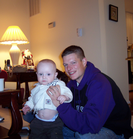 My stepson Ned with my grandson Braydon.