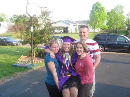 Ashley's graduation - She is in the middle - Christa is the one on the left, Tiffany on the right and Josh Tiff's husband in the back!