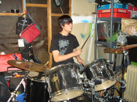 Tyler playing his drums