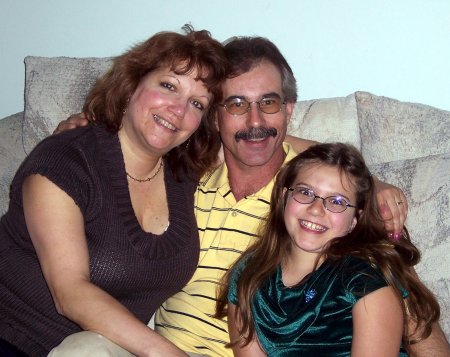 My husband Tim, myself and our daughter Ariana - Thanksgiving 2006