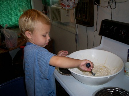 Chris helping Me with breakfast.