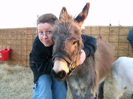My son Richie with our donkey Bella