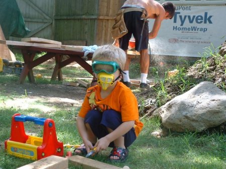 Hunter building the house with Daddy