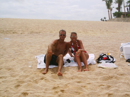 My wife Alesia and I relaxing on the beach in Cabo