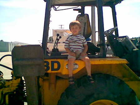 buddy on tractor