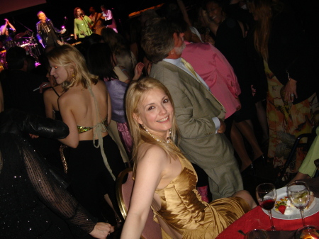 Giving my feet a rest at our We Are Family Foundation Gala in 2005.