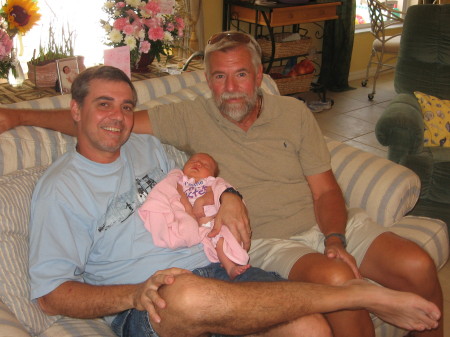 My husband Bill holding Baby Gennie and his dad Jim