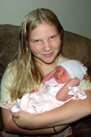 Rebekah holding her new niece, Paytn.