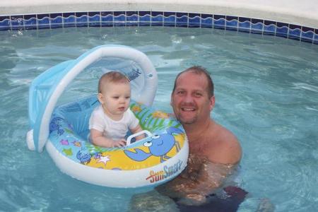 Julia and I swimming at our home in Palm Coast, FL