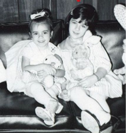 Me (left) at about 4 with my big sister Caryl.