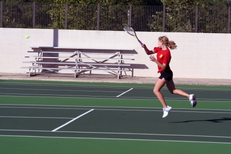 Christine playing tennis