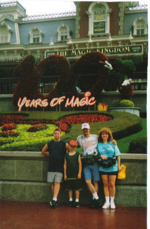 Disneyworld !  Husband Tim, Sons Dan and Eric and me
