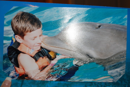 Zack swimming with the Dolphins