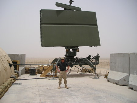 Me in front of tactical radar antenna