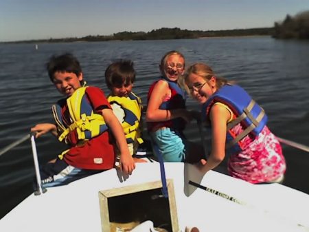 Kids on the boat out at the lake..