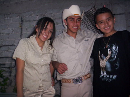 Ariana, Carlos and their cousin Rafael in the middle