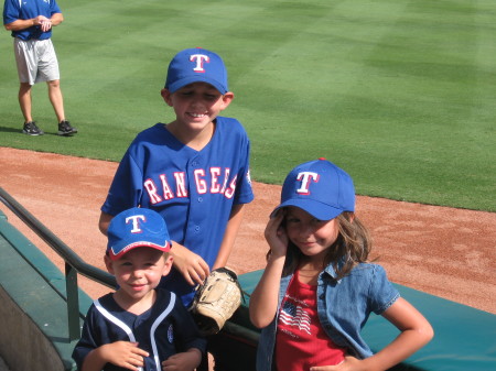 Tad, Bailey and Hank at a TX Rangers game