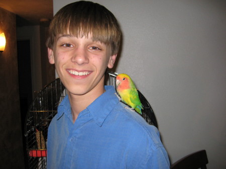 My Middle Son with Jerry our Bird!