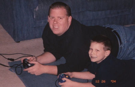 My husband and my son playing video games